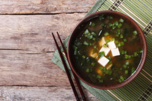 Japanese miso soup with tofu on the table.