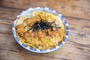 Katsudon deep fried pork cutlet with egg on rice - japanese food