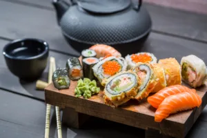 Closeup of fresh sushi on wooden board