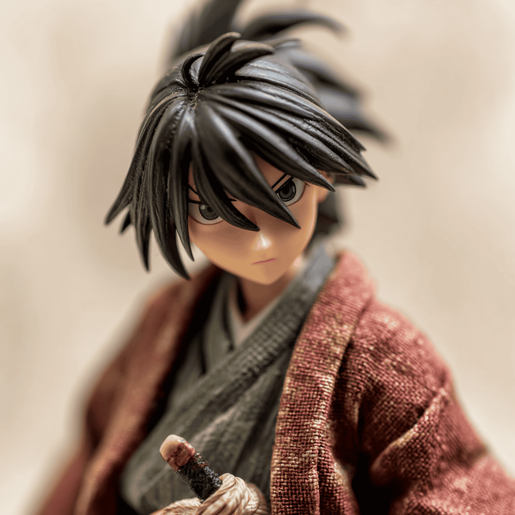 Close-up of a 1/8 scale anime statue showing fabric folds and hand-painted facial detail