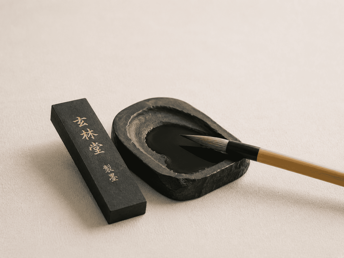 Japanese ink stone with brush for calligraphy or ink painting.