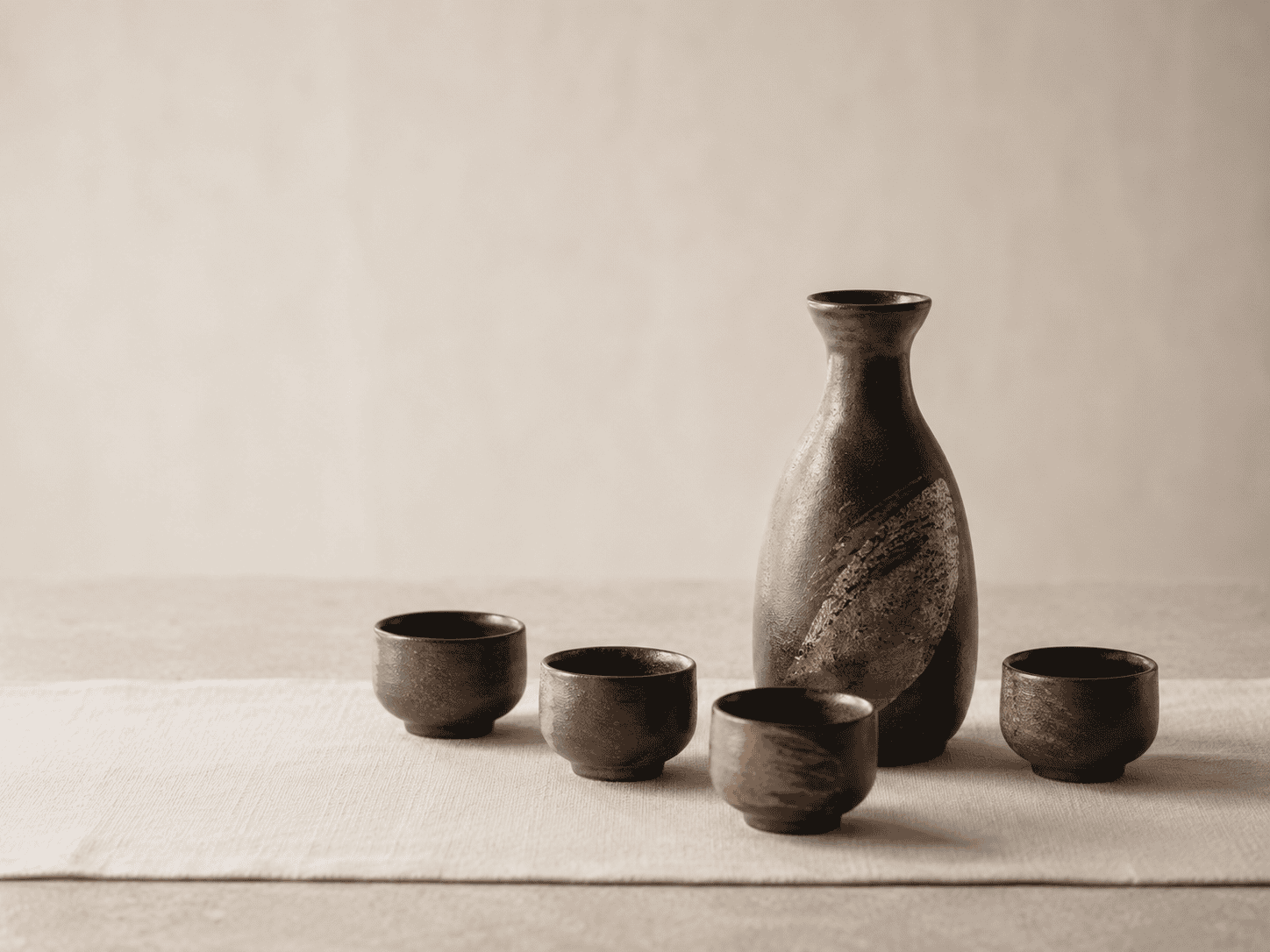Mino Ware Kuro Oribe sake set