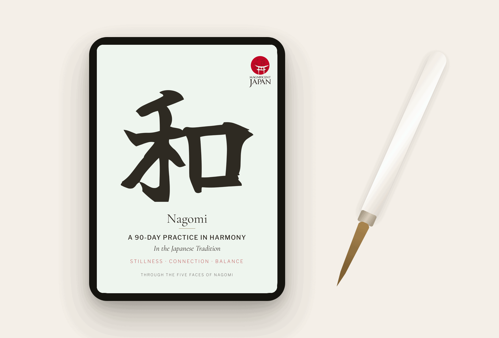 The Nagomi Journal shown on a tablet beside a brush