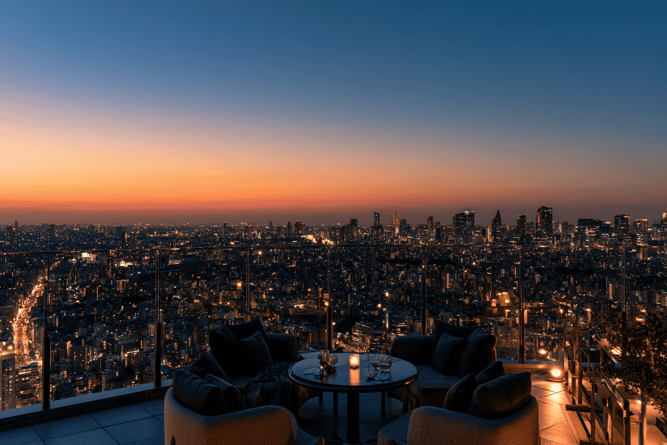Open rooftop observation deck at dusk above a lit city grid