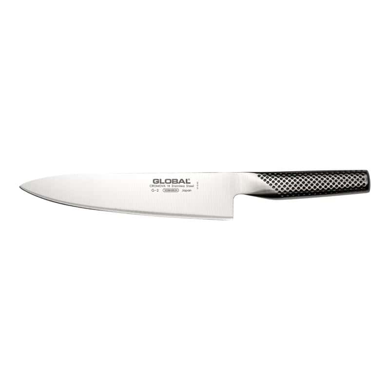 A Global G-2 chef's knife with a seamless stainless steel blade and dimpled handle