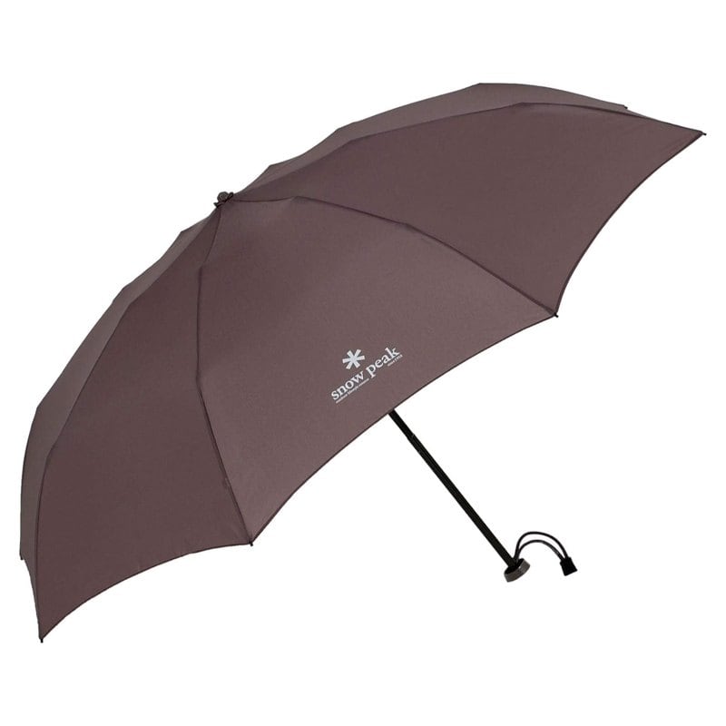 A compact gray Snow Peak ultralight umbrella with an aluminum frame