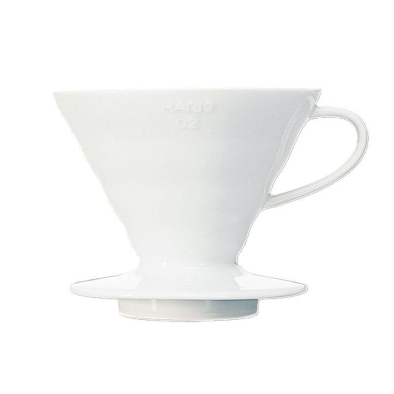 A white Hario V60 ceramic coffee dripper with spiral ridges inside the cone