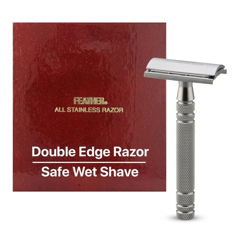 A stainless steel Feather AS-D2 double-edge safety razor beside its red box