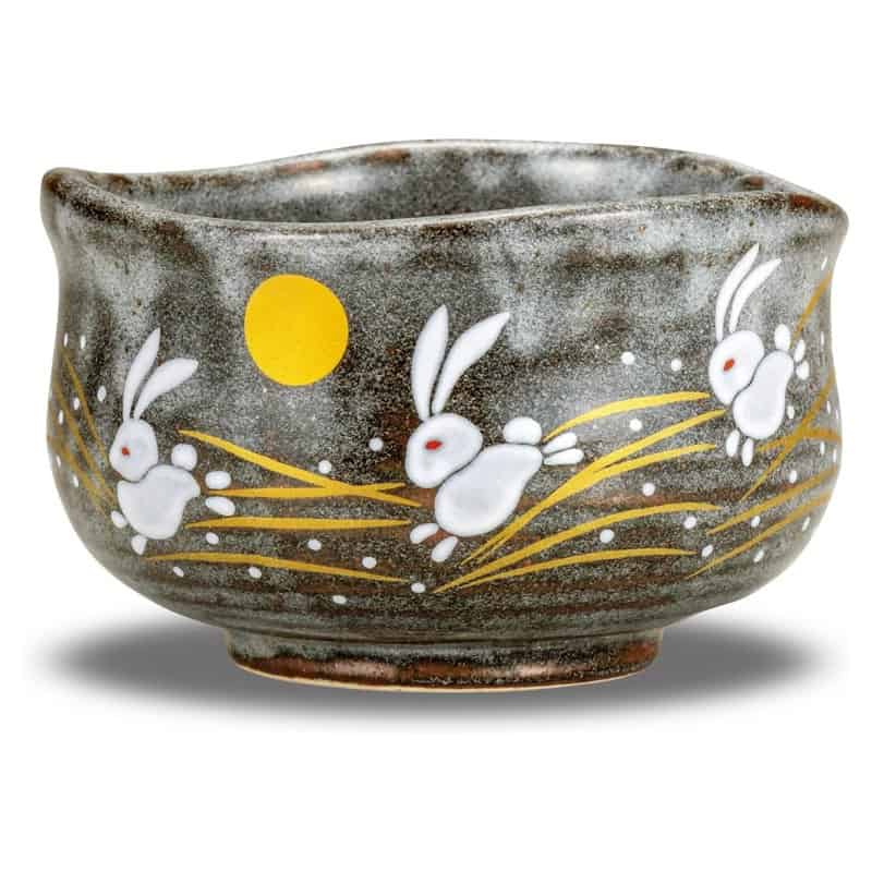 A gray Kutani ware matcha bowl with a rabbit motif, made in Ishikawa, Japan