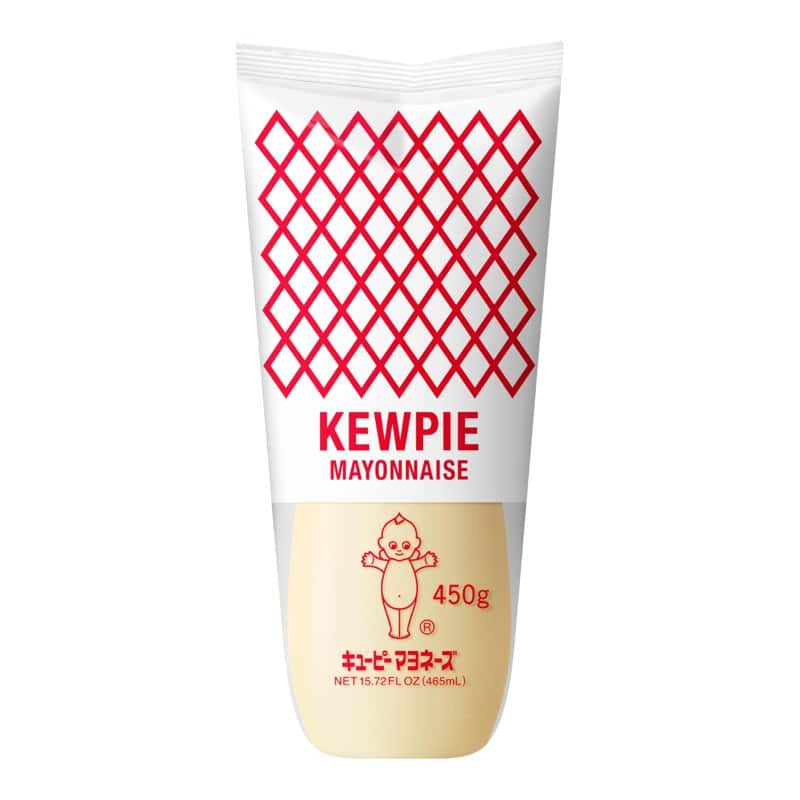 A soft squeeze bottle of Kewpie mayonnaise with its red lattice pattern and baby logo
