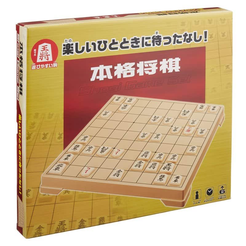 A Hanayama classical shogi set in its box, showing a wooden board and pieces