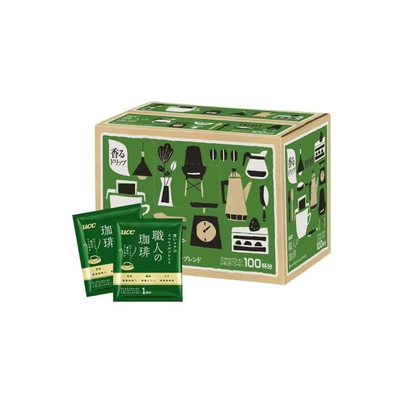 A green UCC Shokunin coffee box with individual drip-bag pouches