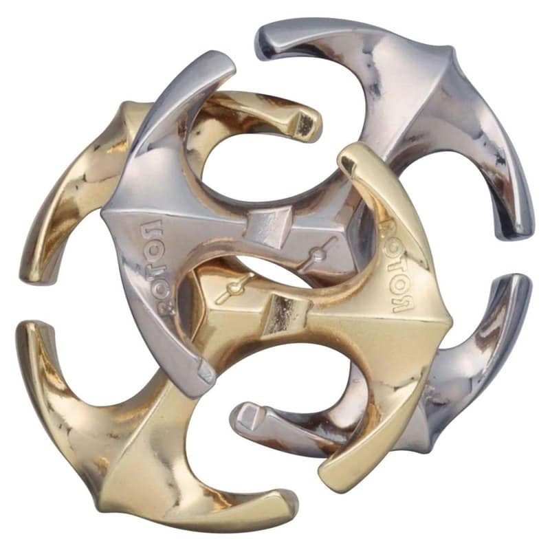 A Hanayama Cast Huzzle Rotor puzzle made of interlocking silver and gold metal pieces