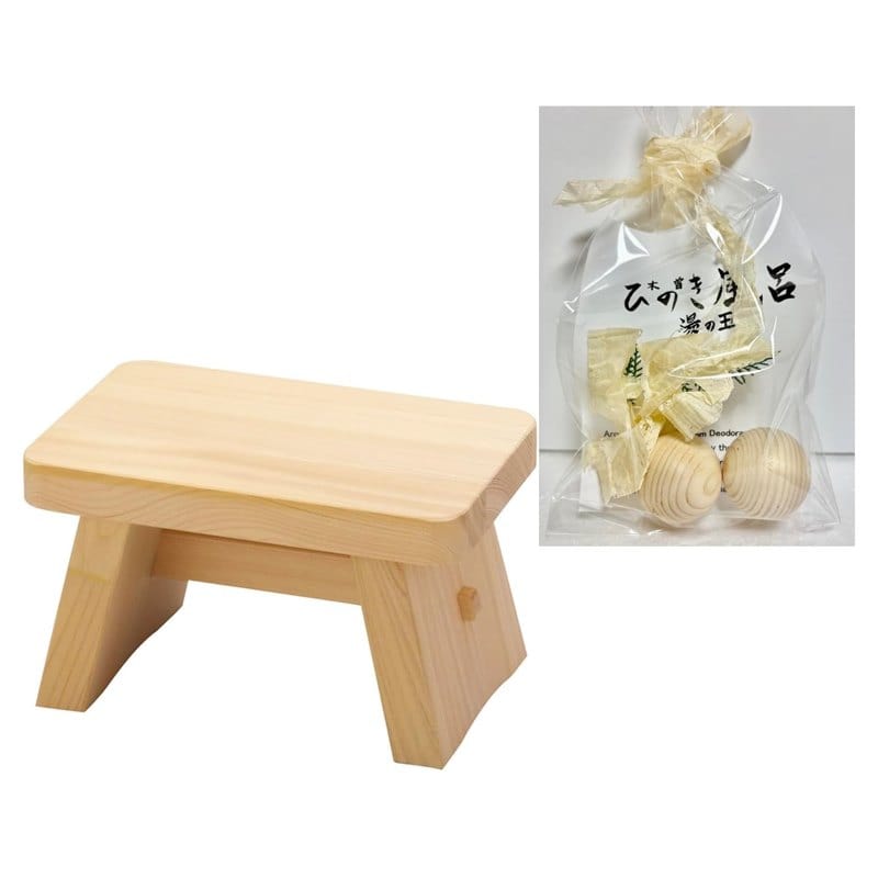 A small square bath stool made of pale Kiso hinoki cypress wood, made in Japan
