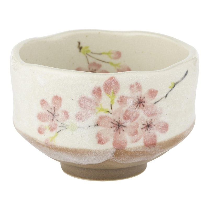 A cream Mino ware ippuku bowl painted with pink cherry blossom branches