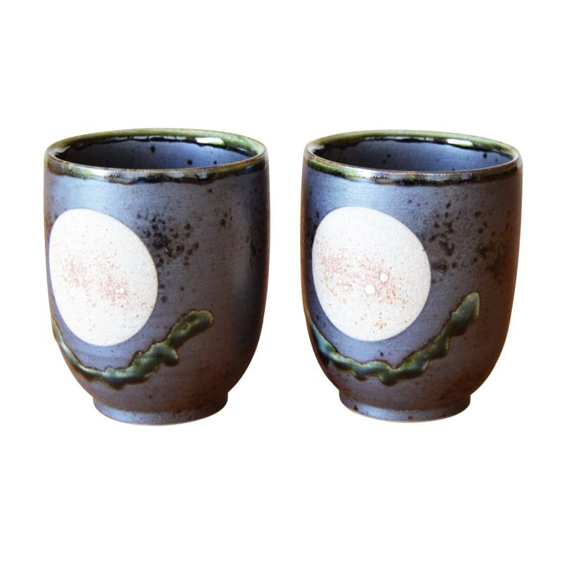 Two Arita Imari yunomi tea cups with a full-moon design and dark glaze