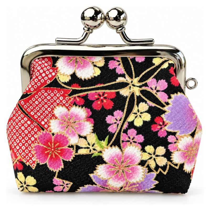 A small black coin purse with a cherry blossom Edo Komon pattern and a metal clasp, made in Japan