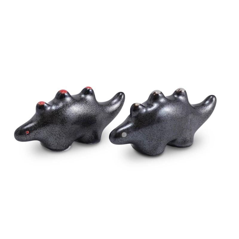 Two black Mino ware chopstick rests shaped like small dinosaurs