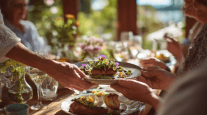 Guests sharing beautifully plated Japanese cuisine at a scenic outdoor setting.